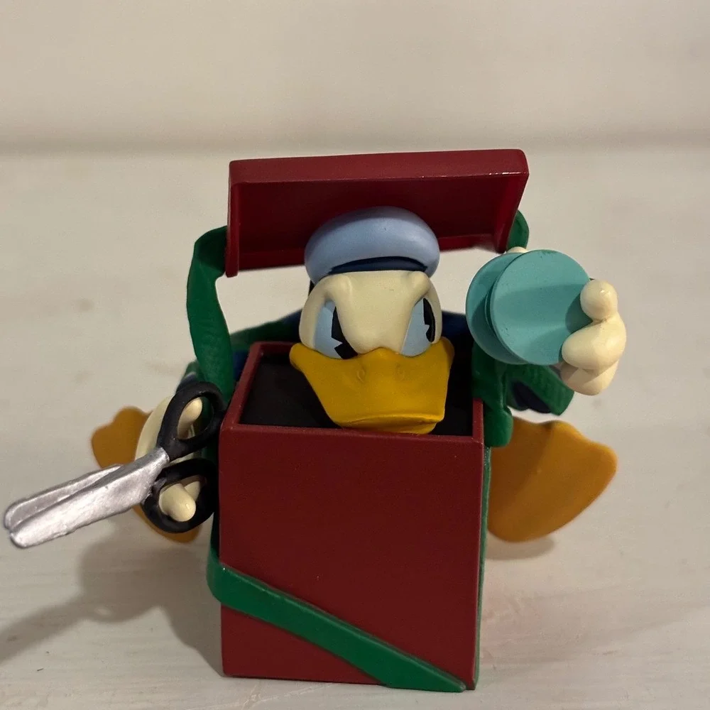 Hallmark Keepsake 1997 Donald's Surprising Gift Archives Series Ornament QXD4025